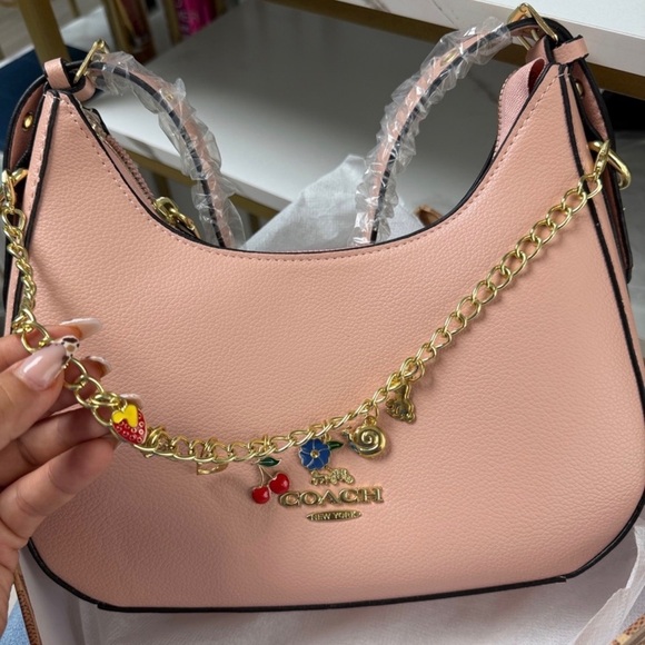 Coach Handbags - Coach Pink Leather Charm Shoulder Bag with Gold Chain